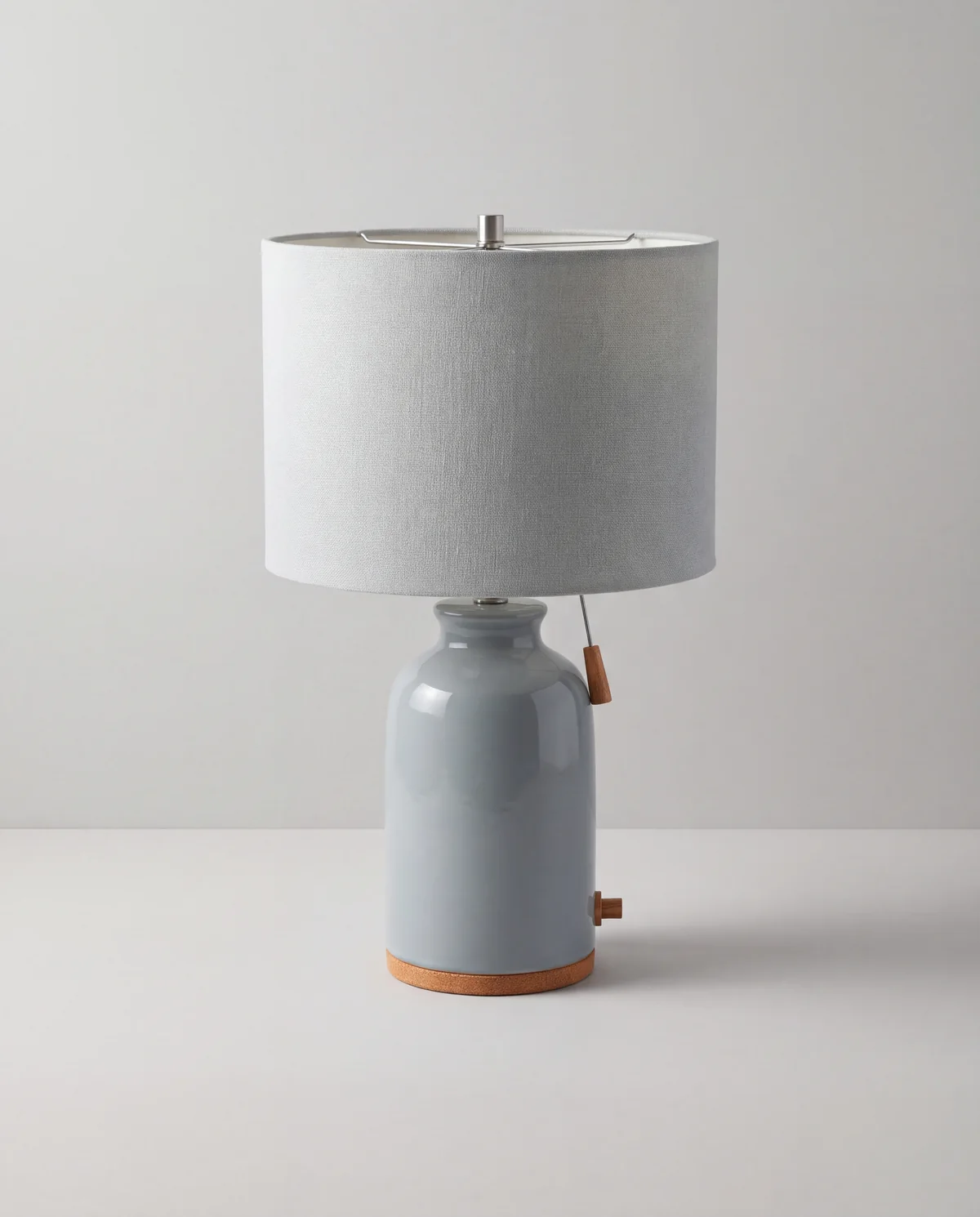 Ceramic table lamp, About 26 in tall, ceramic base with a fabric drum or tapered shade