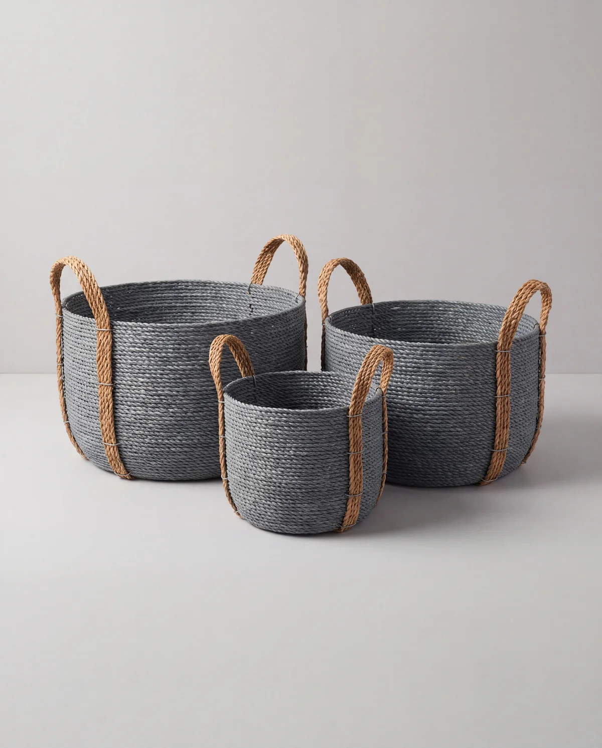 Woven storage basket trio, Set of 3 graduated woven baskets with handles
